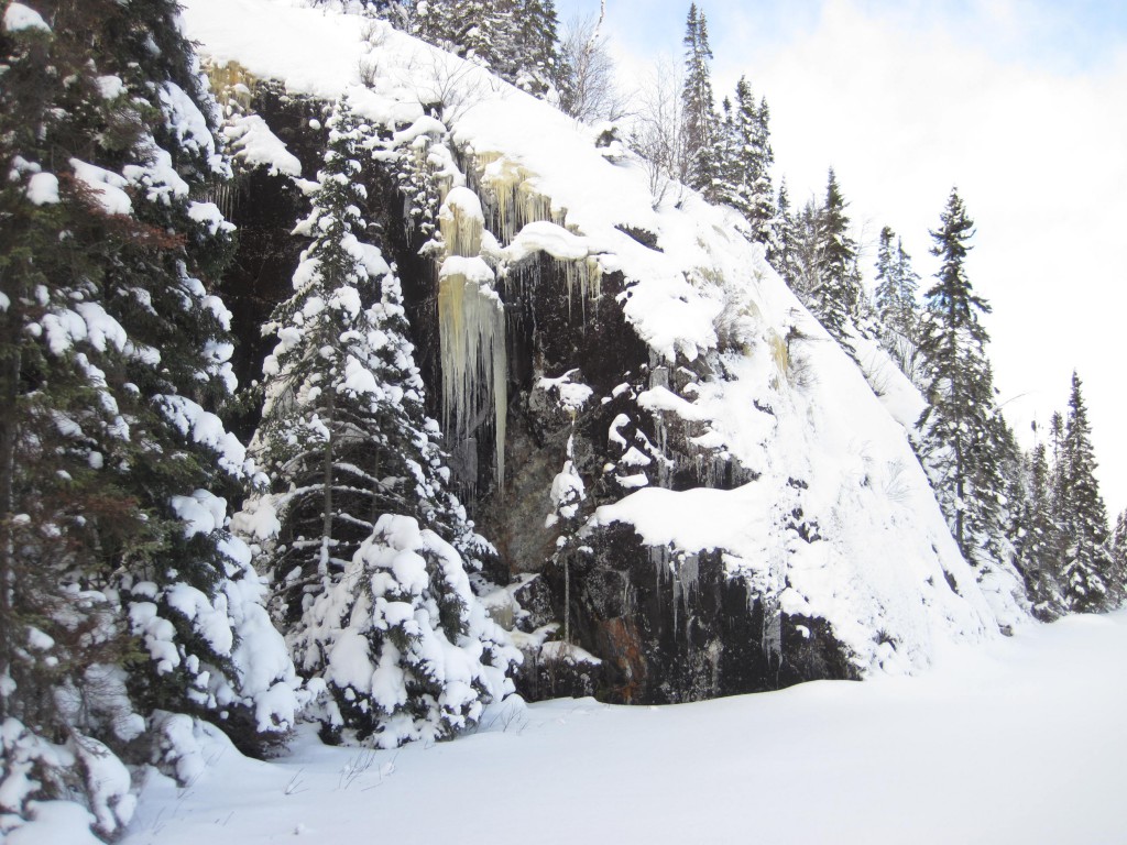 Icicles on a rock face on Flying Lake winter Boundary Waters 