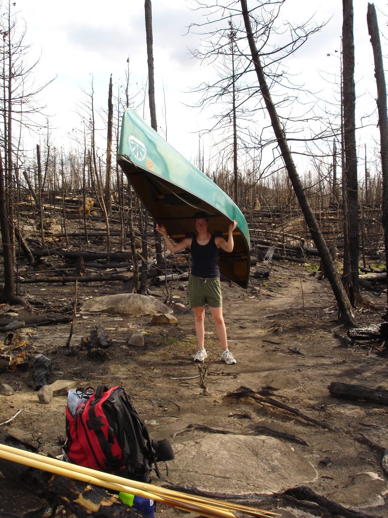 Portaging through the Cavity Wildfire area in 2006 